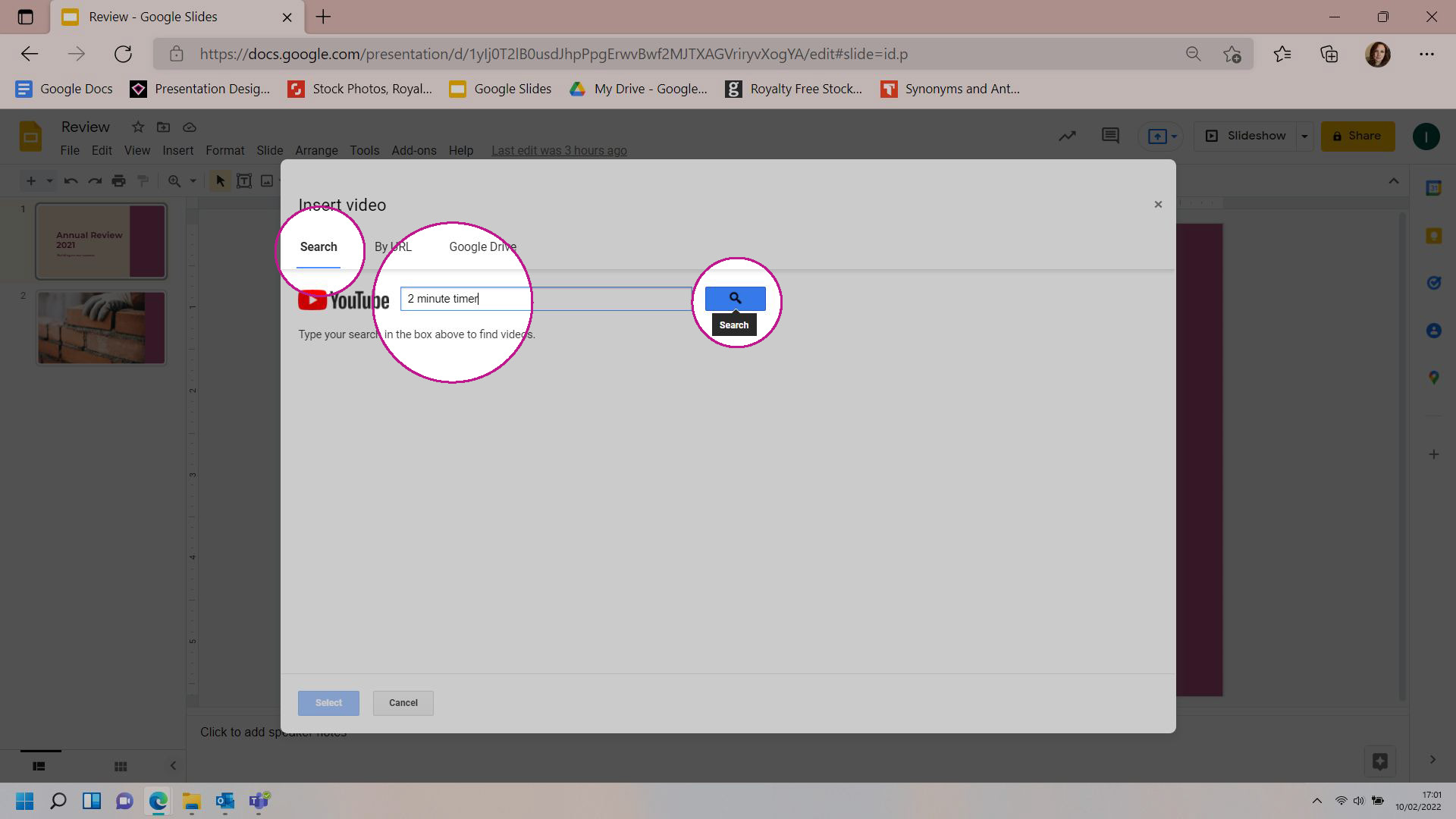 Screenshot of Google Slides showing the Insert Video pop up. The search tab is selected and the YouTube Search bar is on the screen. In the search bar is the text "2 minute timer"