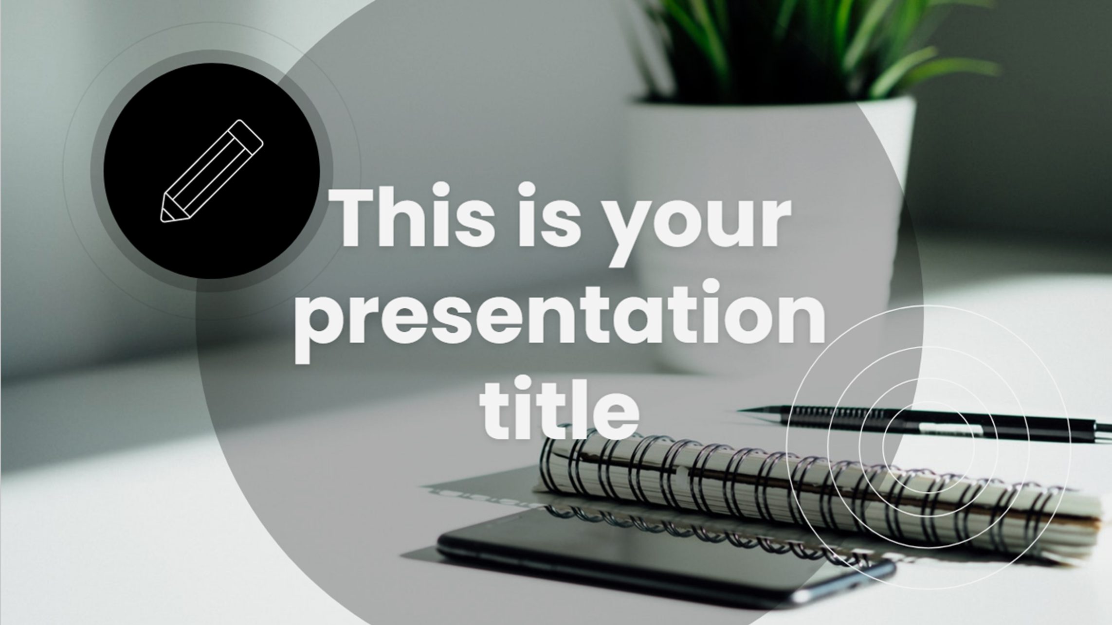 Google Slides template title slide with desk image in the background